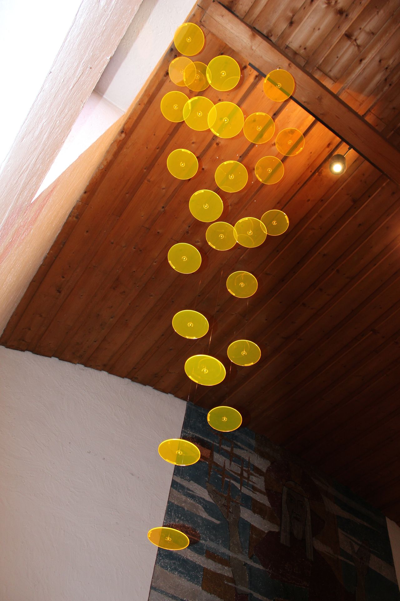 wooden ceiling with hanging sun catchers