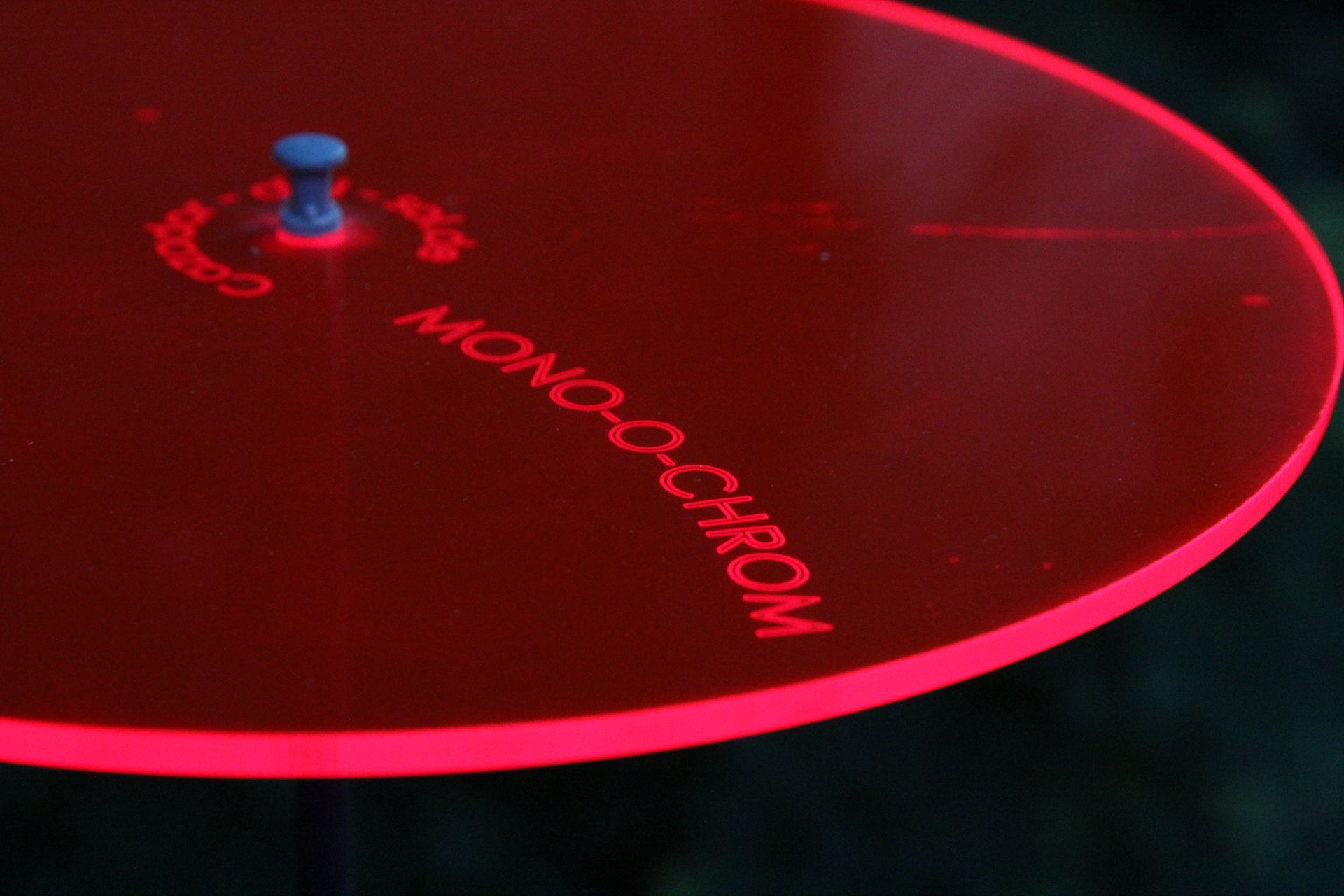 special engraving on red disc